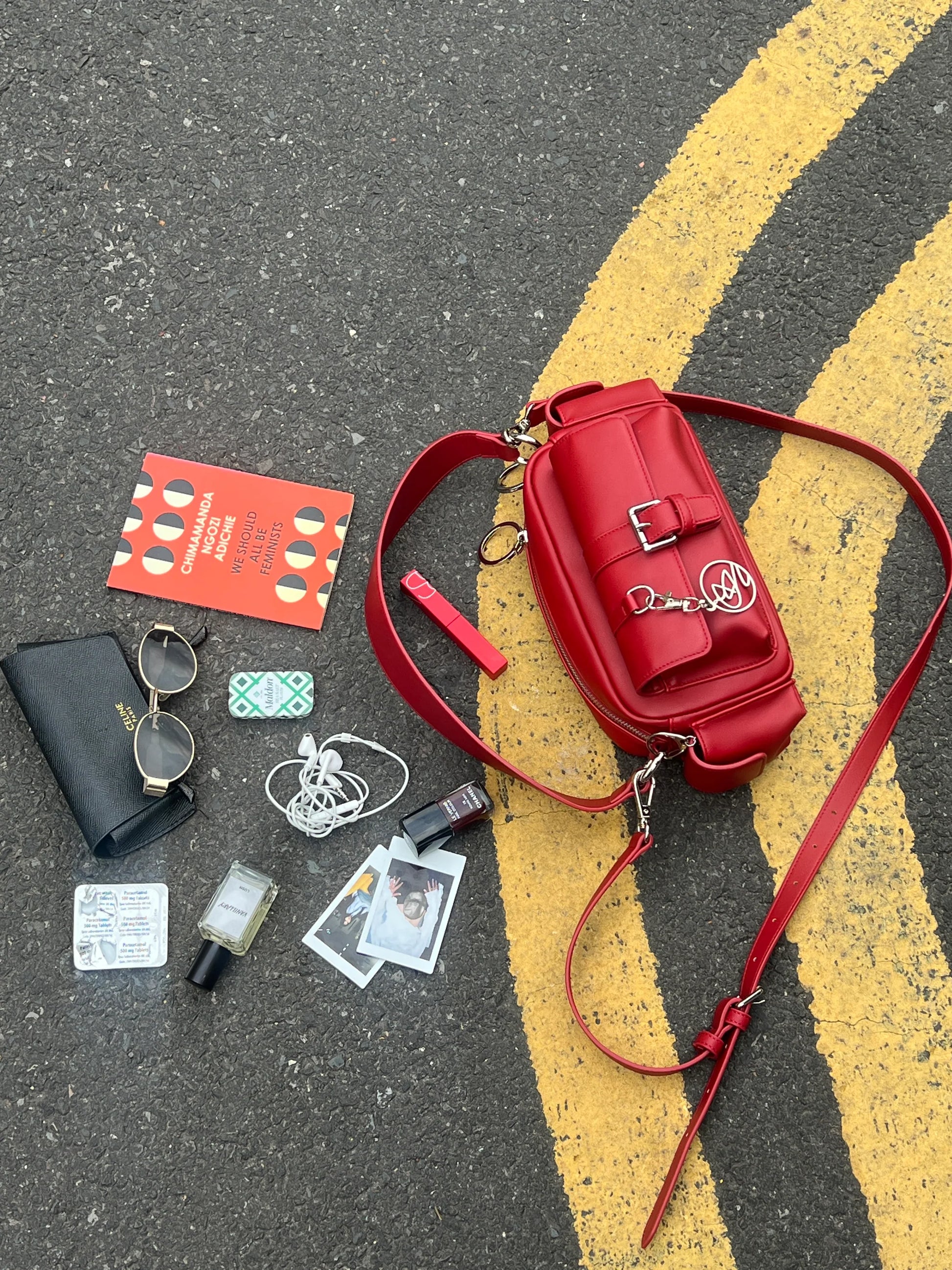 Accessible shoulder bag open showing easy-access compartments and everyday essentials